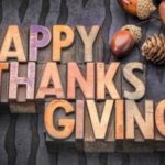 Wooden letters spelling 'HAPPY THANKSGIVING' with acorns and pine cones on a textured surface, promoting B & D HVAC services.