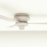 Ceiling fan featuring a minimalist design with light fixture and blades, perfect for enhancing HVAC system efficiency.