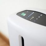 Sleek air purifier with digital control panel, enhancing indoor air quality for homes by B & D Plumbing, Heating & A/C.